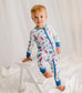 Child wearing a patterned onesie featuring maine lobsters, boats, lighthouses, and buoys 