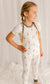 Young girl wearing a white pajama set with  Maine lighthouse 