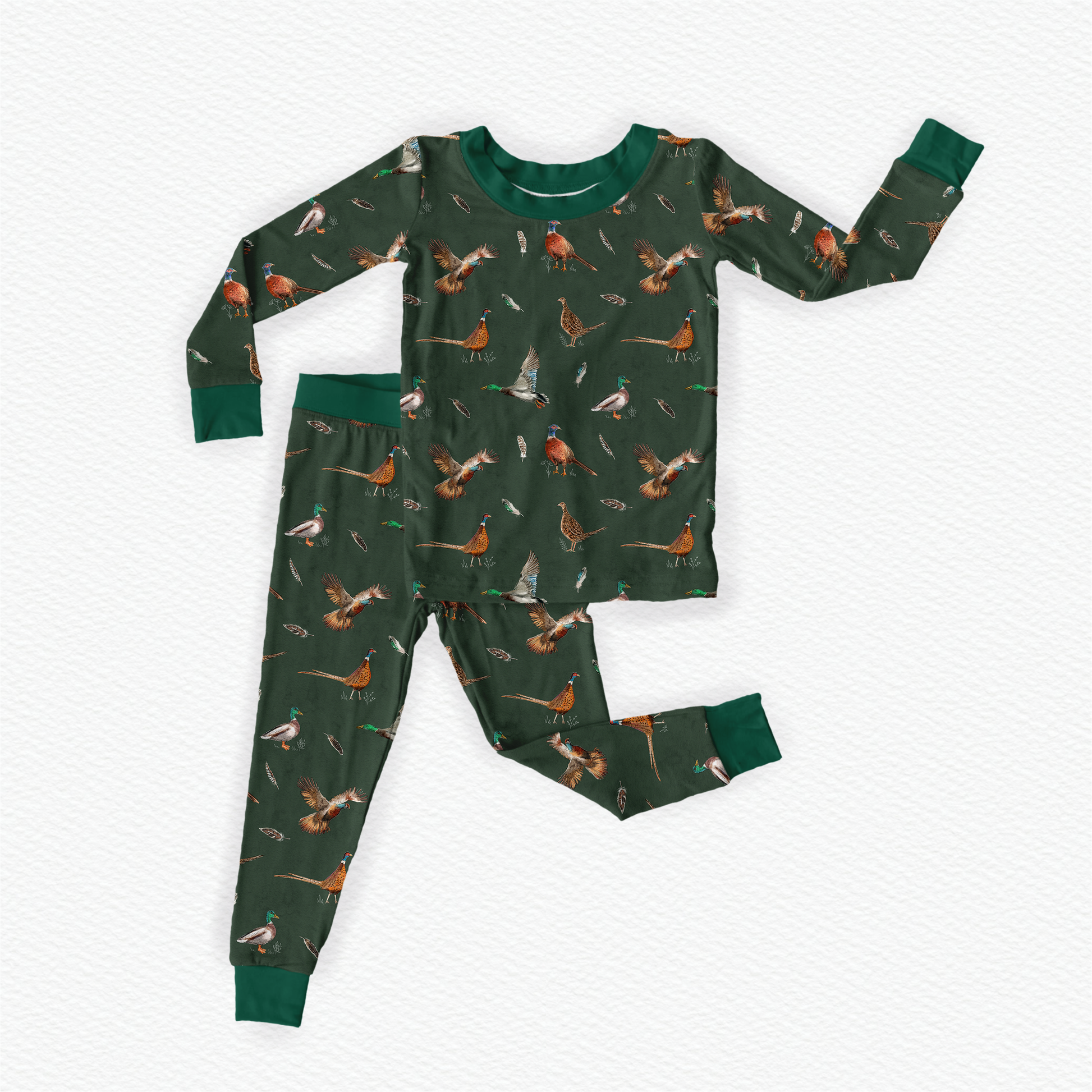 Children's pajama set with different Maine wild game birds pattern on a dark green background 