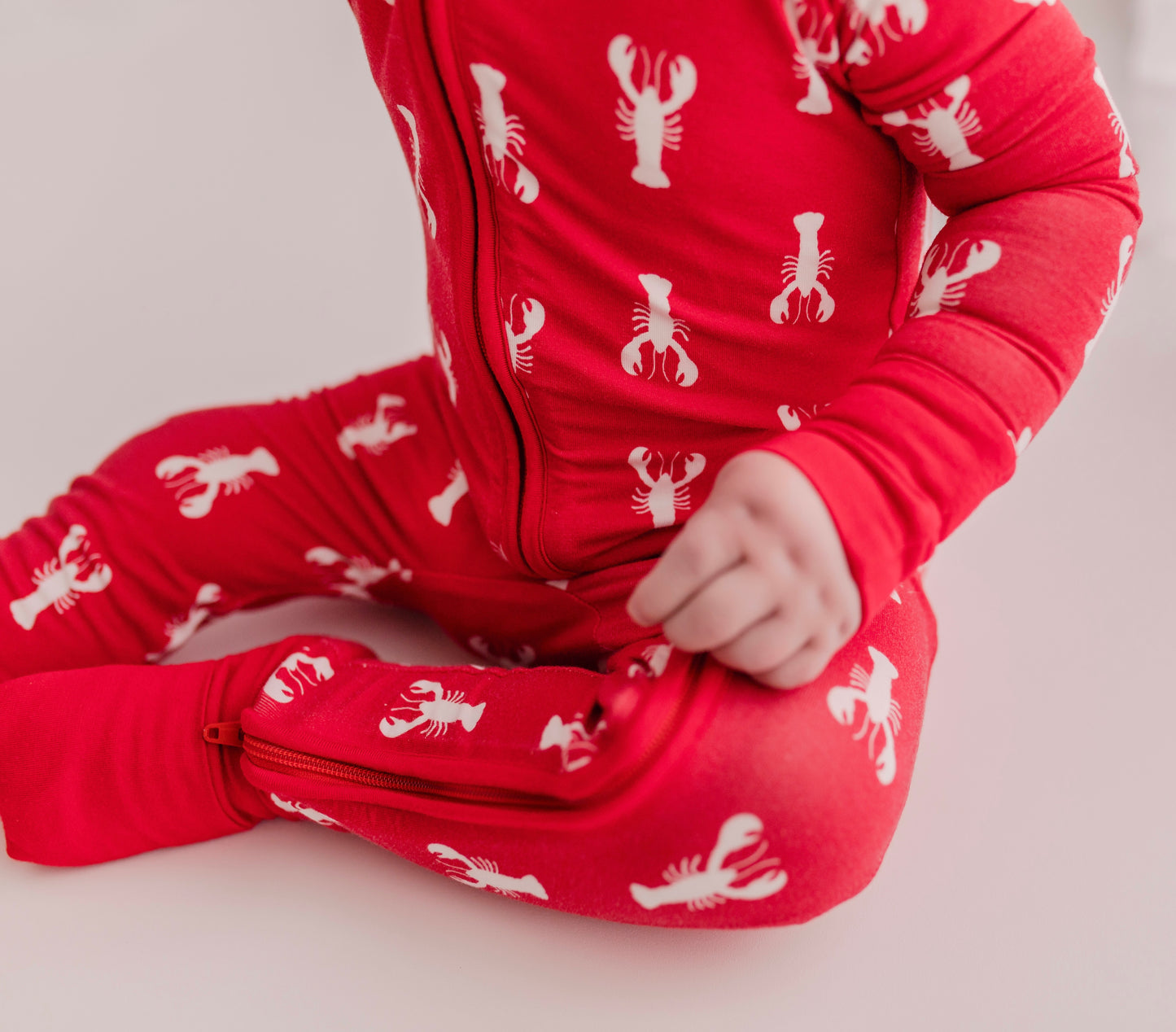 Red one piece pajama with white Maine lobsters and red cuffs 