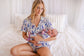 Kristina - Light Lupines Zippy Romper