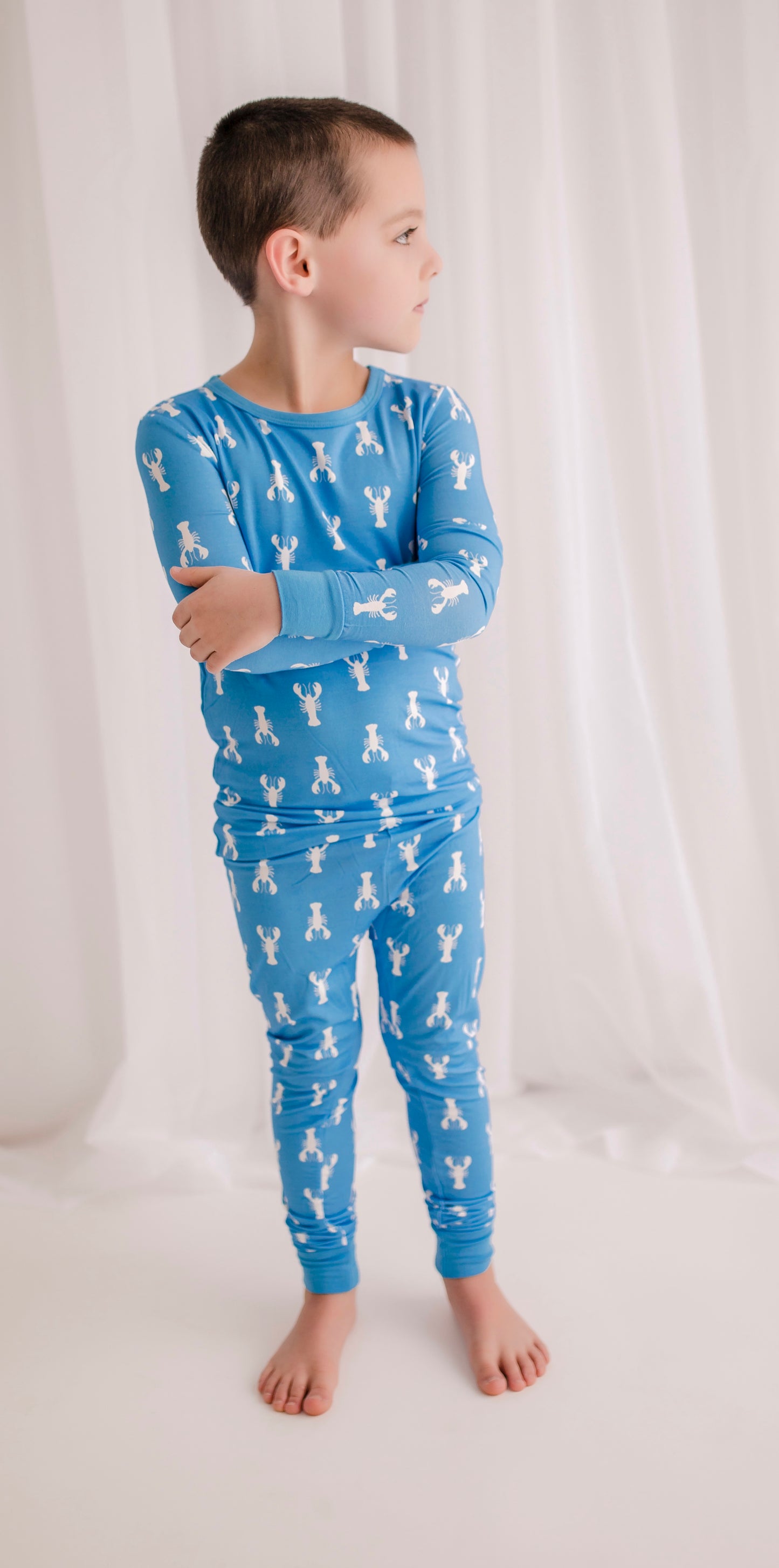 Long sleeve light blue pajama set with white lobster pattern
