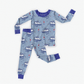 Children's light blue pajama set with floating boats and buoys, with waves and seagulls on the atlantic ocean 