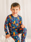 Child wearing a colorful pajama set with lobsters, crabs, and all the essentials for working on a lobster boat 