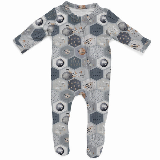 Baby onesie with different shades of gray hexagons with a space themed print that includes planets, the moon, stars, and rockets. 